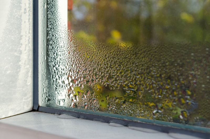 Humidity water droplets on window.